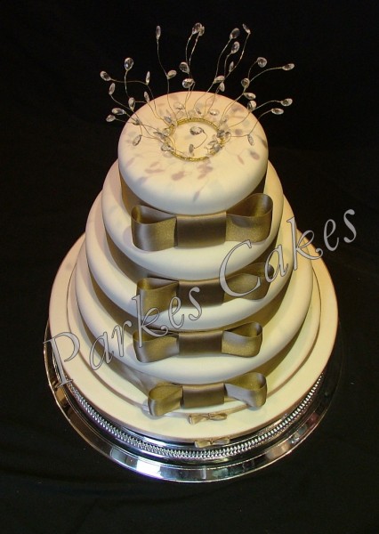 4 tier ivory large bow wedding cake